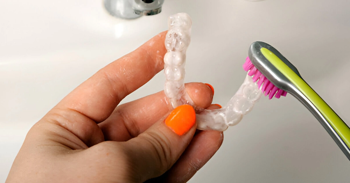 How should you clean an Invisalign case